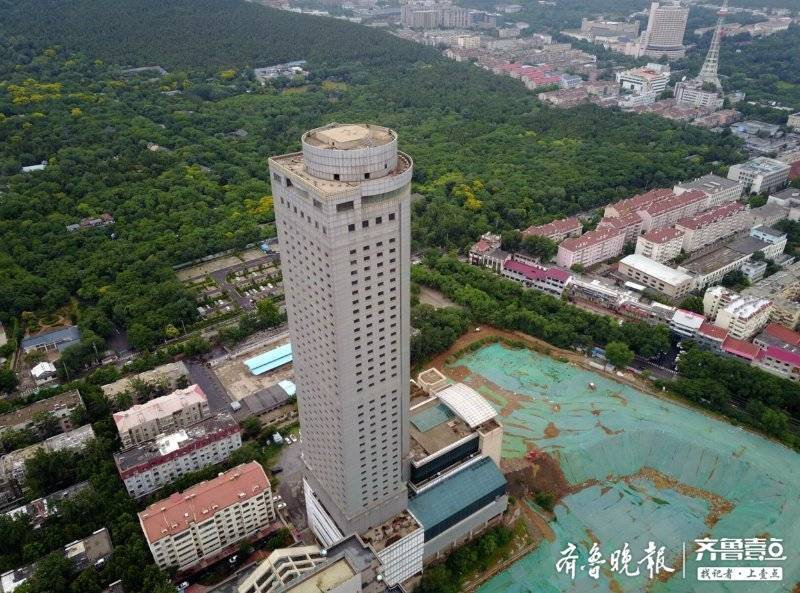 大众报业·齐鲁壹点烂尾24年，济南这座高楼终于要拆！为济南千佛山北广场让路