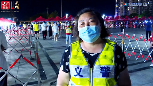 果然视频|每天十几小时,海阳义警光脚执勤坚守检测一线