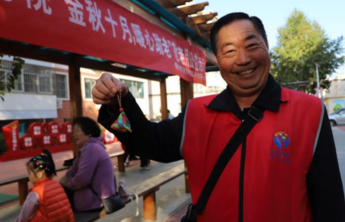 深入社区“双报到” 携手共度重阳节