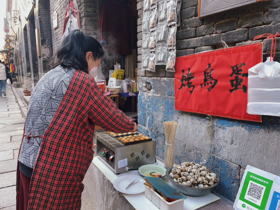 壹点图集 | 周村烧饼、糖画、烤地瓜……周村古商城满满烟火气