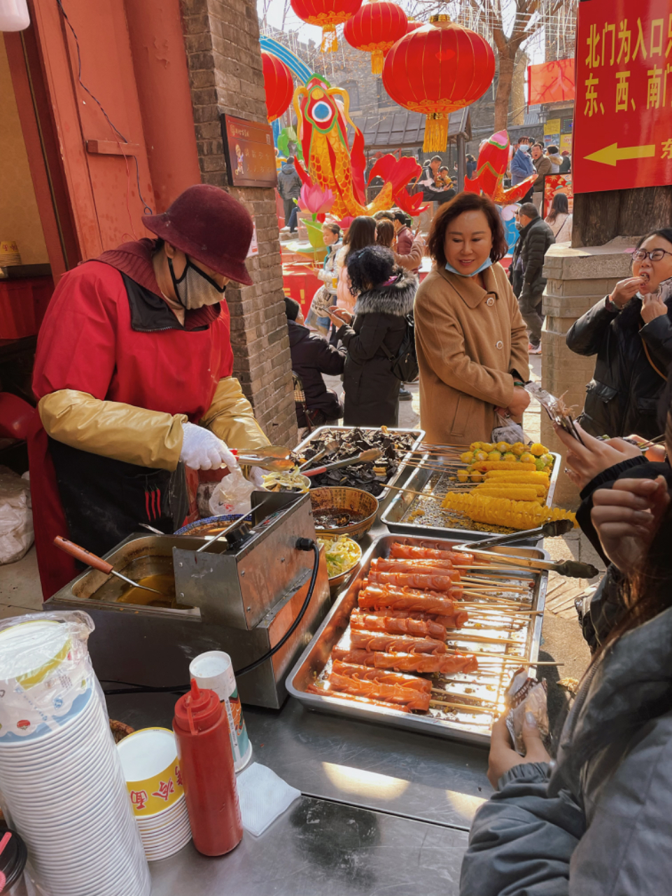 壹点图集 | 周村烧饼、糖画、烤地瓜……周村古商城满满烟火气