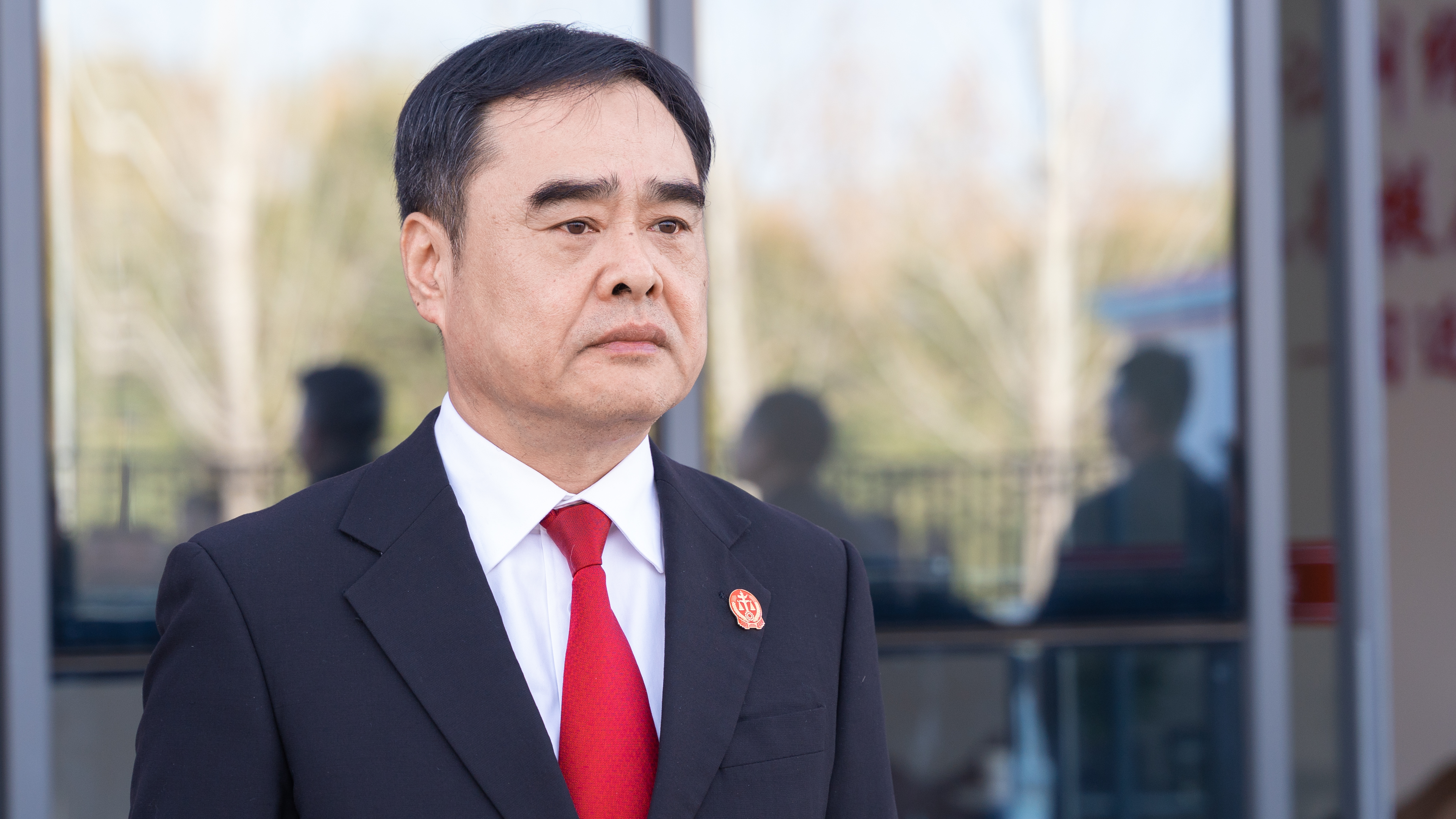 区委常委,政法委书记陈刚,区汽车小镇服务中心党组书记,主任邱献国