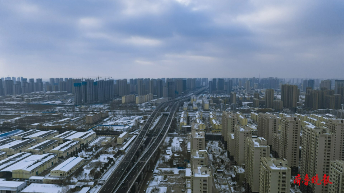 果然视频|雪中“长龙”，菏泽长江路快速通道恢复通车 