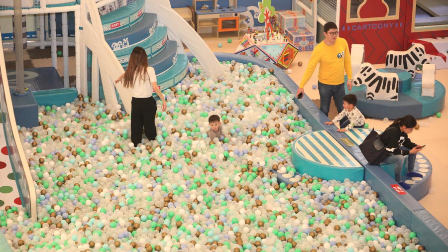 人民日报评论商场变身游乐场就能拿捏家长钱包吗