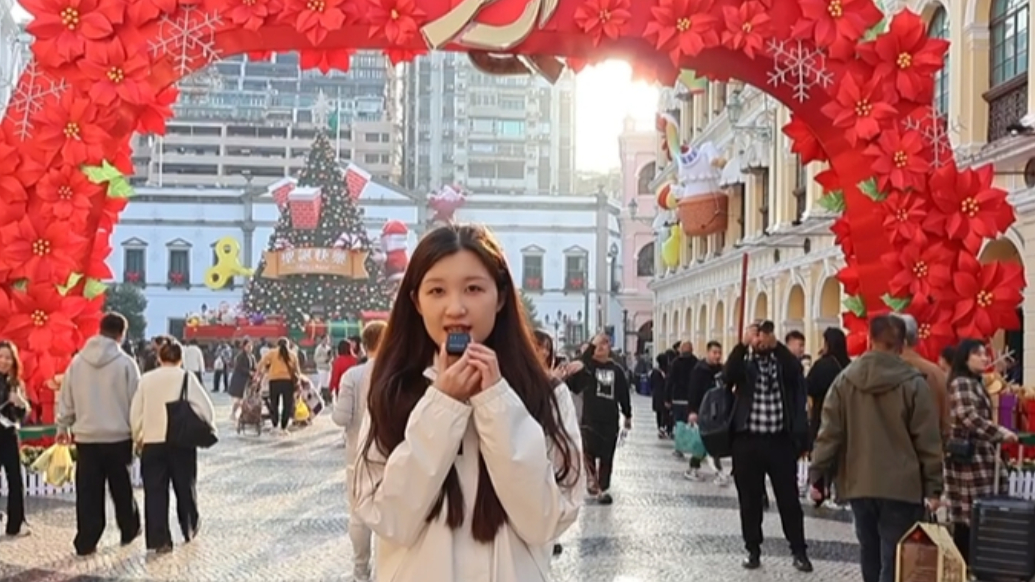 澳门街头充满喜庆氛围，中外人士送上祝福