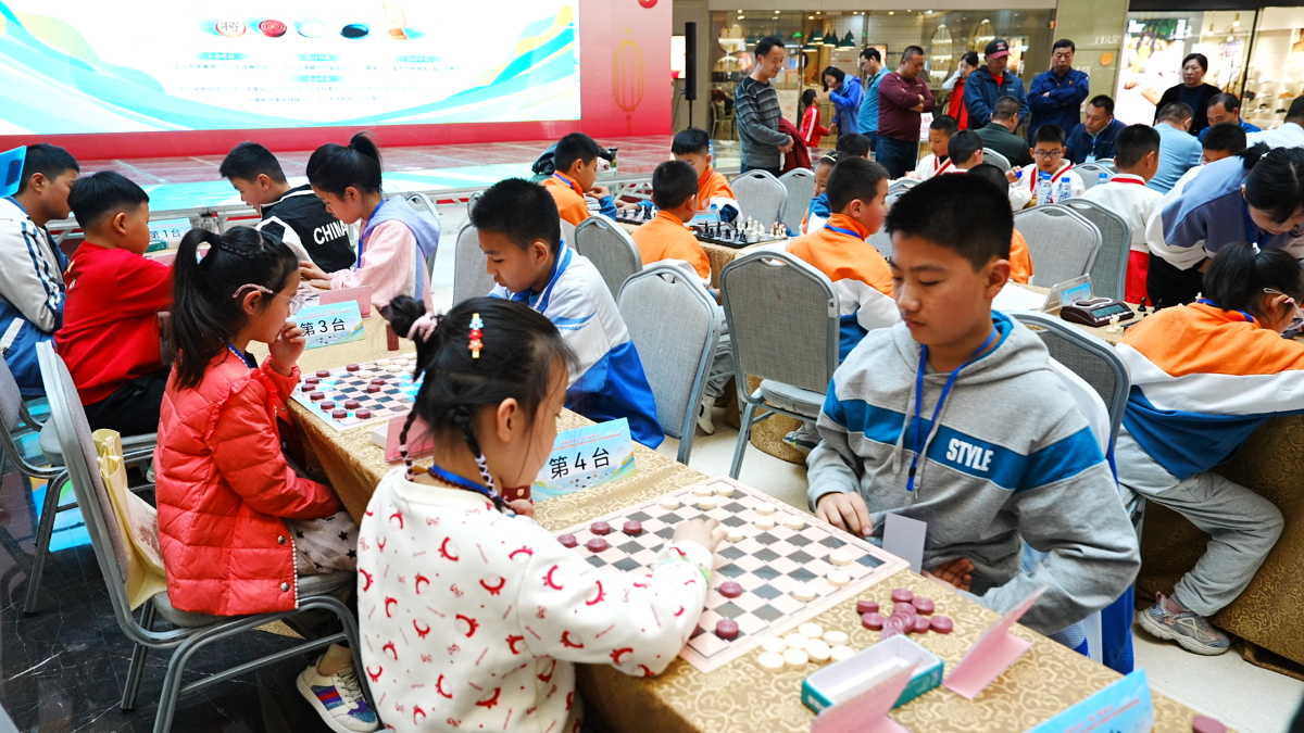 首届智运会热身赛已“落子”，每周末到龙贵购物广场“棋逢对手”