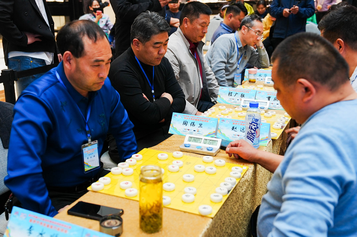 首届智运会热身赛已“落子”，每周末到龙贵购物广场“棋逢对手”
