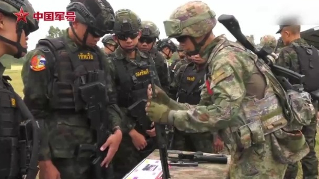 武器互换火力全开！近距离感受中泰海军联合训练-视频中心-齐鲁晚报网