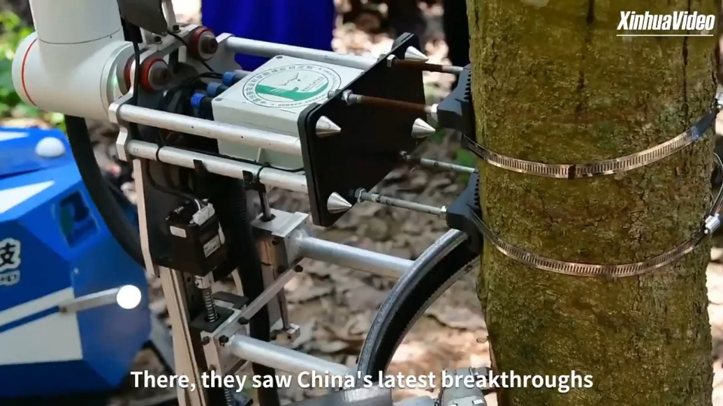Chinese rubber-tapping robots draw interest from agricultural experts