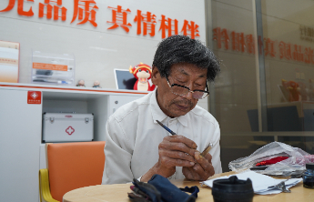 存保十年 守护万家⑦：以“笔”为媒，非遗技艺镌刻金融安全承诺