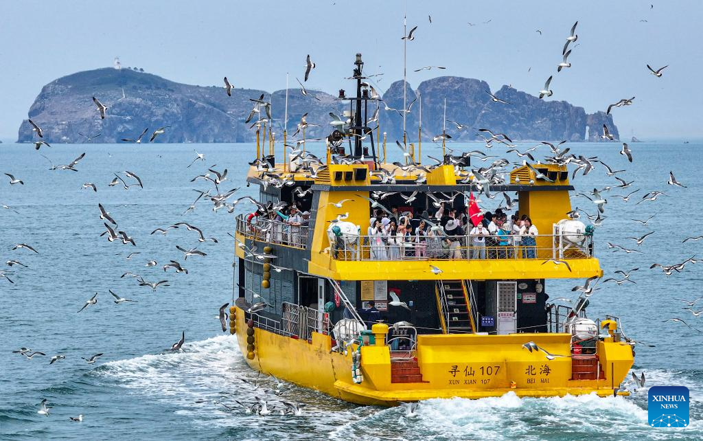 China sees 2.7 pct increase in cross-border trips during Dragon Boat Festival holiday