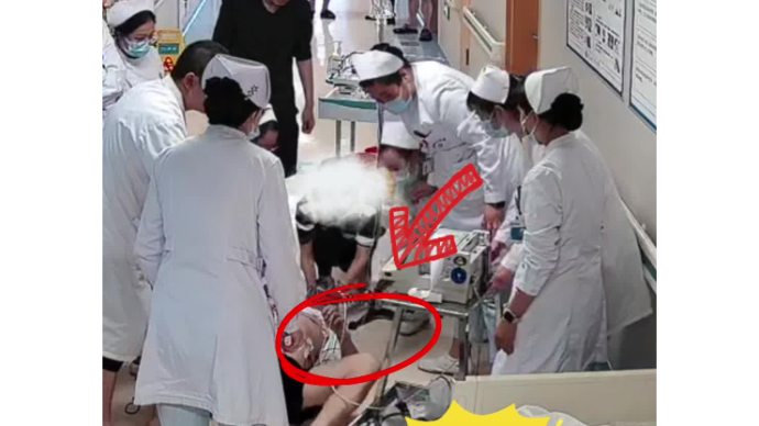 一患者办理住院手续时，突然意识丧失，医生护士立即启动生死营救