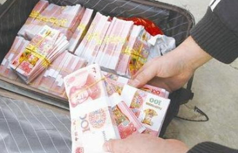 惩治制贩假币不容松劲