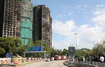 香港特区政府：保证灾民重建家园前有免费住屋