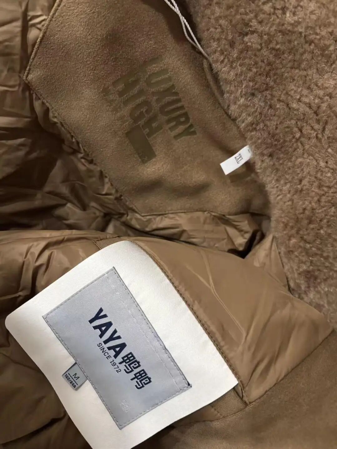 顾客花539元网购的鸭鸭羽绒服竟有“双标双码”？品牌回应