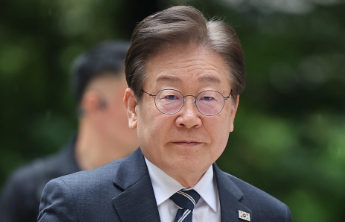 李在明回应金正恩