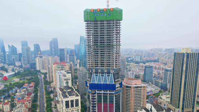 南京路1号主体封顶，攻克世界首例高位“三柱合一”钢结构难题