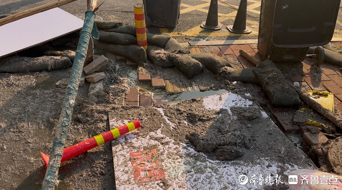 小区排污管渗漏致路面污染物业：将更换管道以彻底维修(图1)